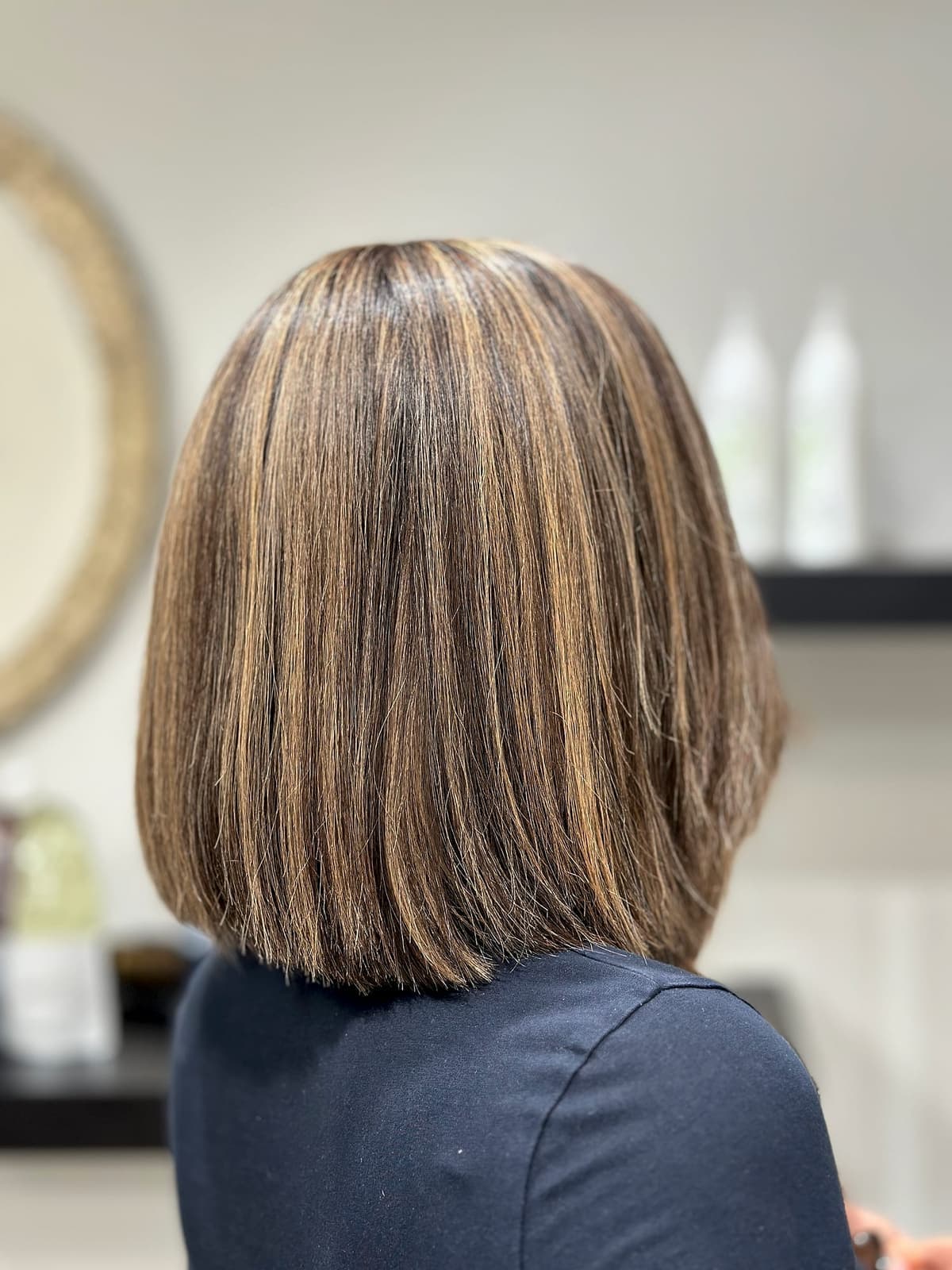 Brunette bob with highlights by The Lounge Marbella