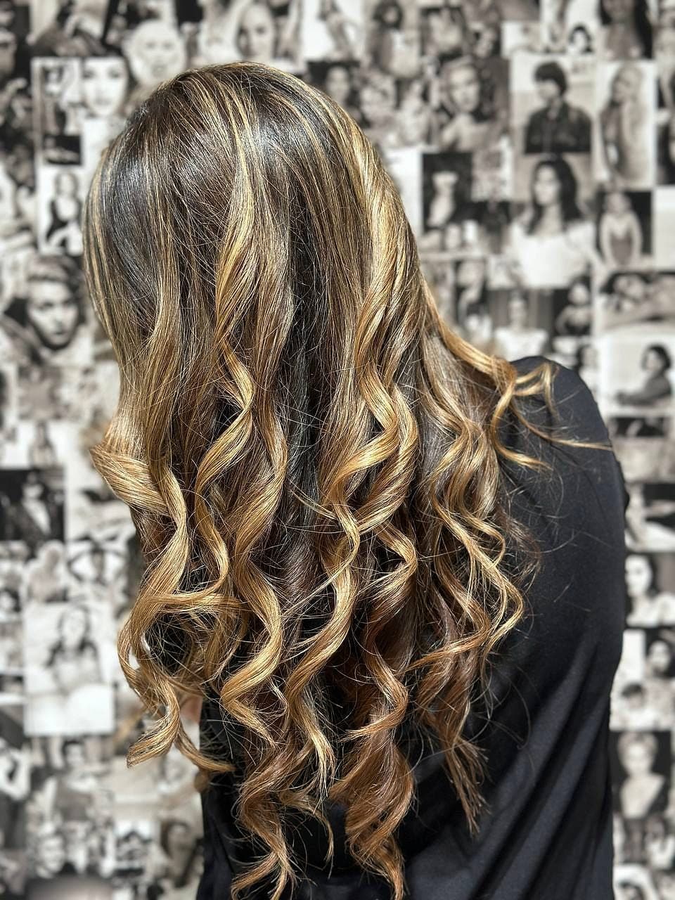 Glam highlighted curls hair colour Marbella
