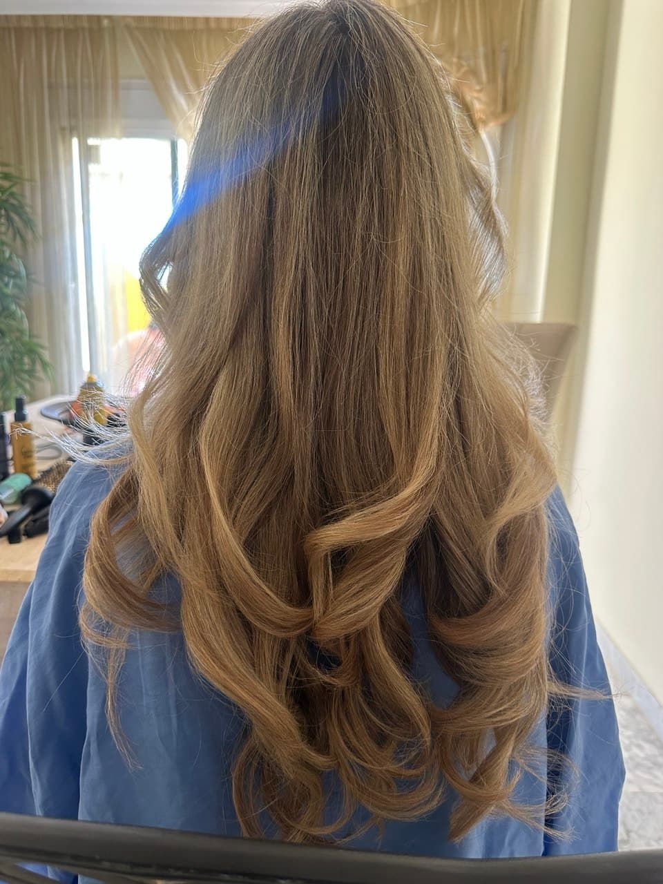 Long curls styled at a client's villa before a wedding in Marbella