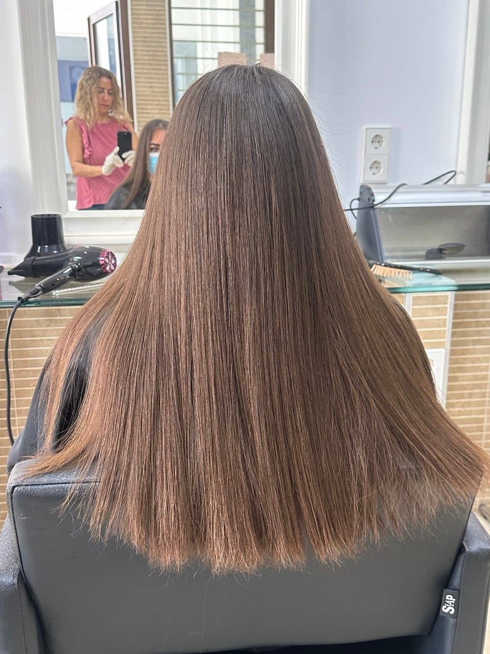Smooth, shiny hair right after a Hair Botox treatment at The Lounge Marbella